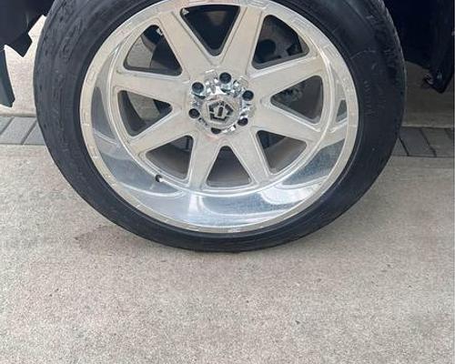 TIS 22x12 wheels polished 6x55 nitto terra grapplers 33x125x22