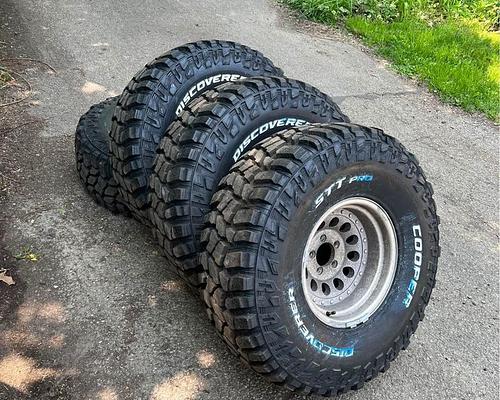 Jeep YJ 15X8 5X45 Rims with 35x1250x15 Cooper Discoverer STT Pro Wheel and Tire Package  Set of 4